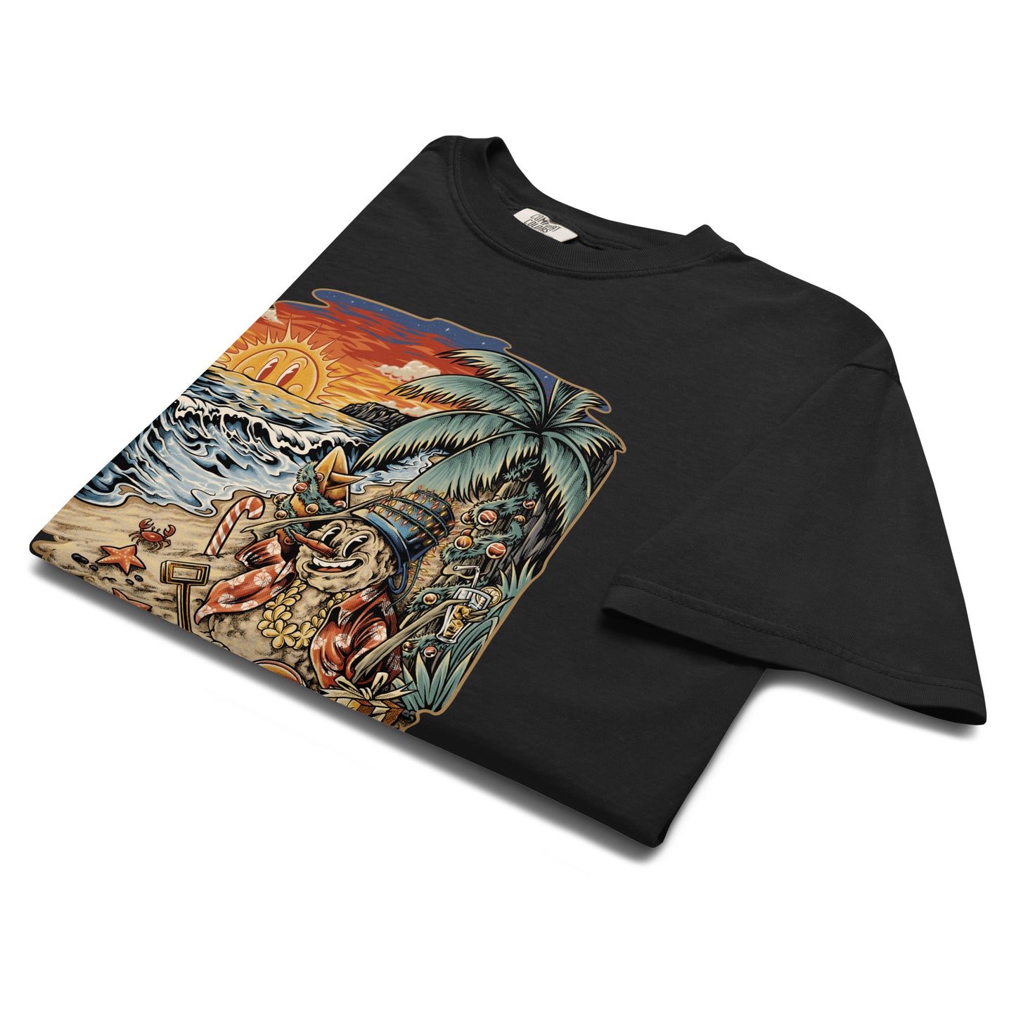 A folded black T‑shirt displaying Frosty the Sandman reclining on a tropical beach, complete with a palm tree, starfish, a beach ball, and an orange sunset.