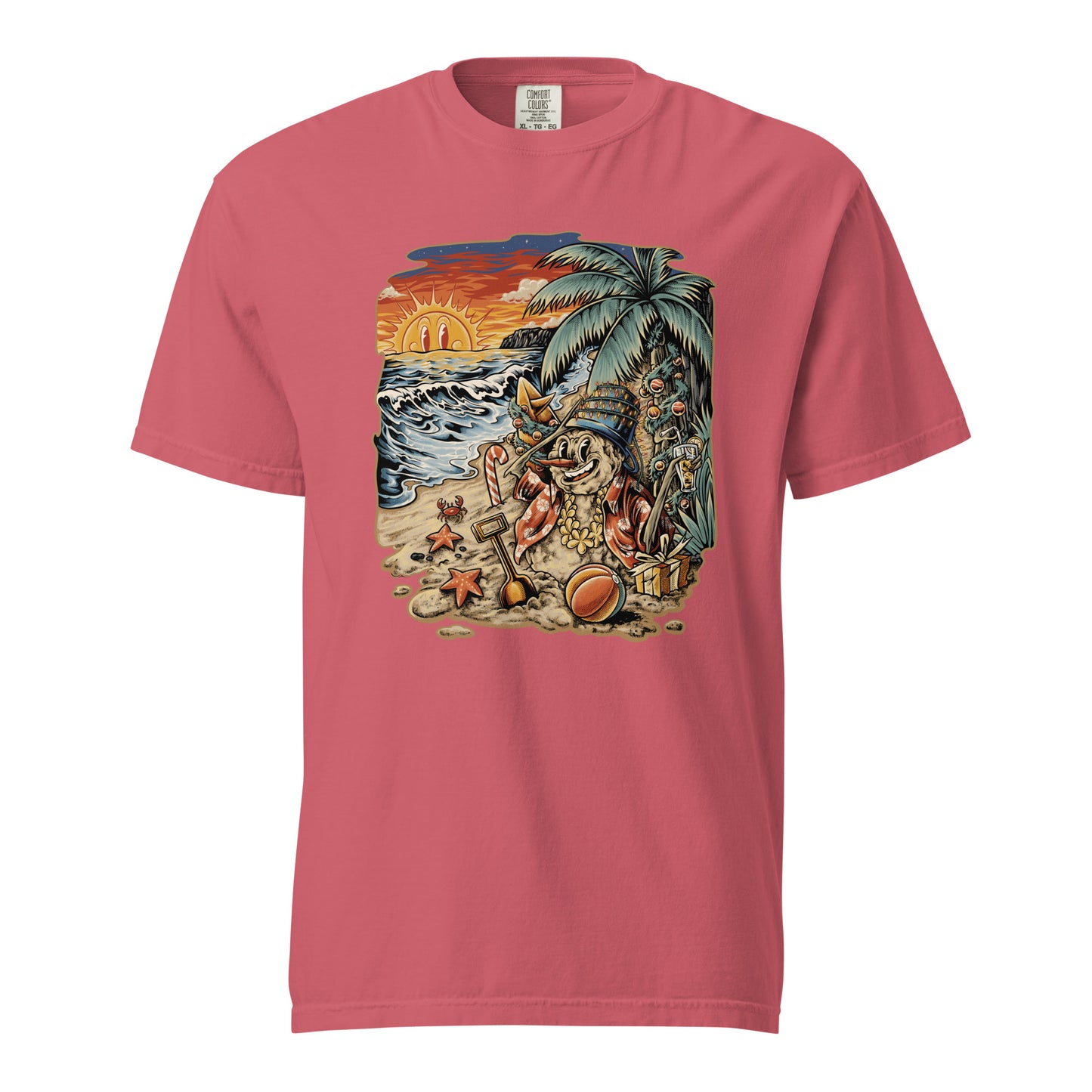 Watermelon colored T‑shirt displaying Frosty the Sandman reclining on a tropical beach, complete with a palm tree, starfish, a beach ball, and an orange sunset.