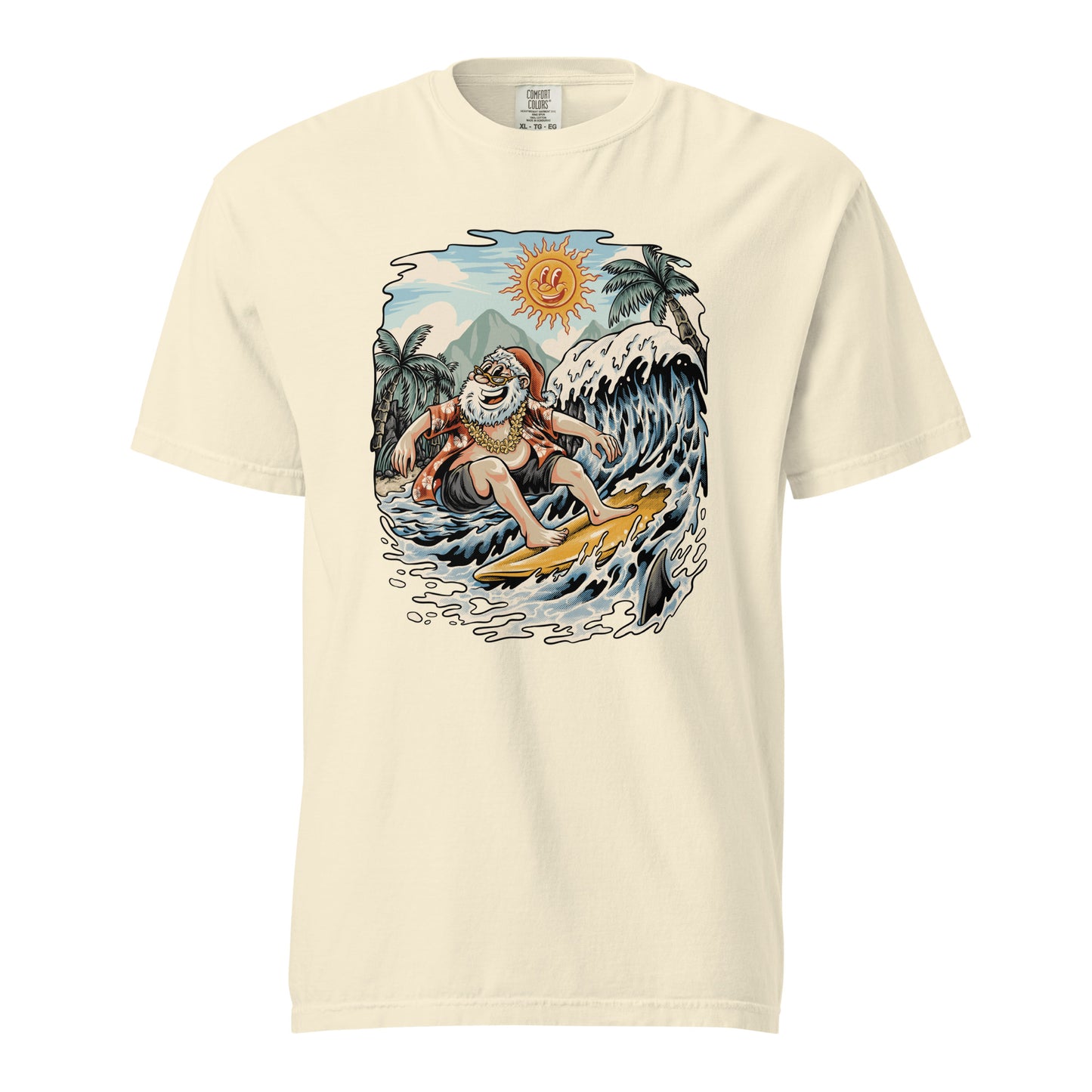Cream colored t-shirt featuring Santa Claus surfing a wave beneath a cheerful sun with palm trees in the distance