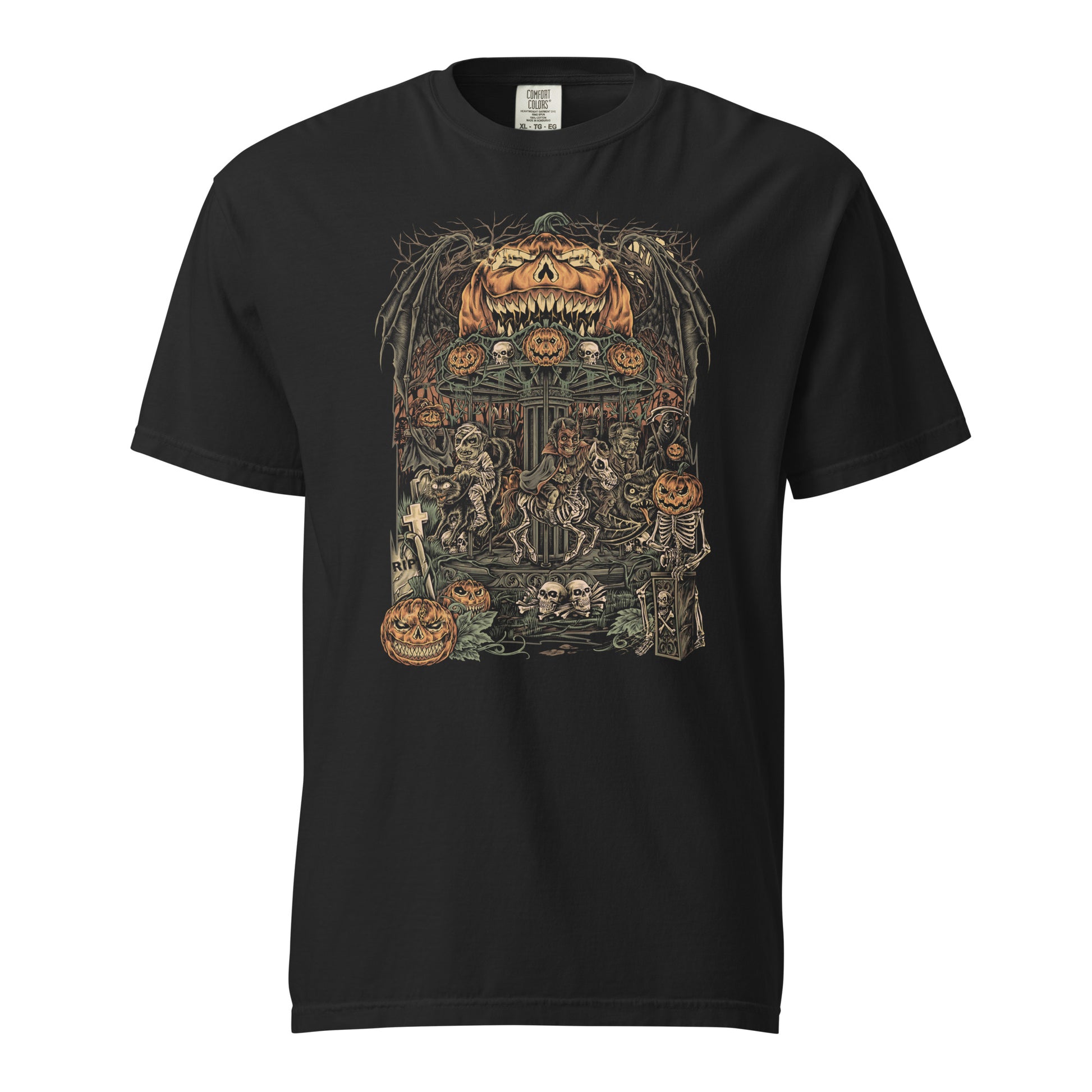 Black halloween T‑shirt featuring a haunted carnival carousel made of jack‑o’‑lanterns with skeletal horses, skulls, bats, and a gravestone under a giant grinning pumpkin head.