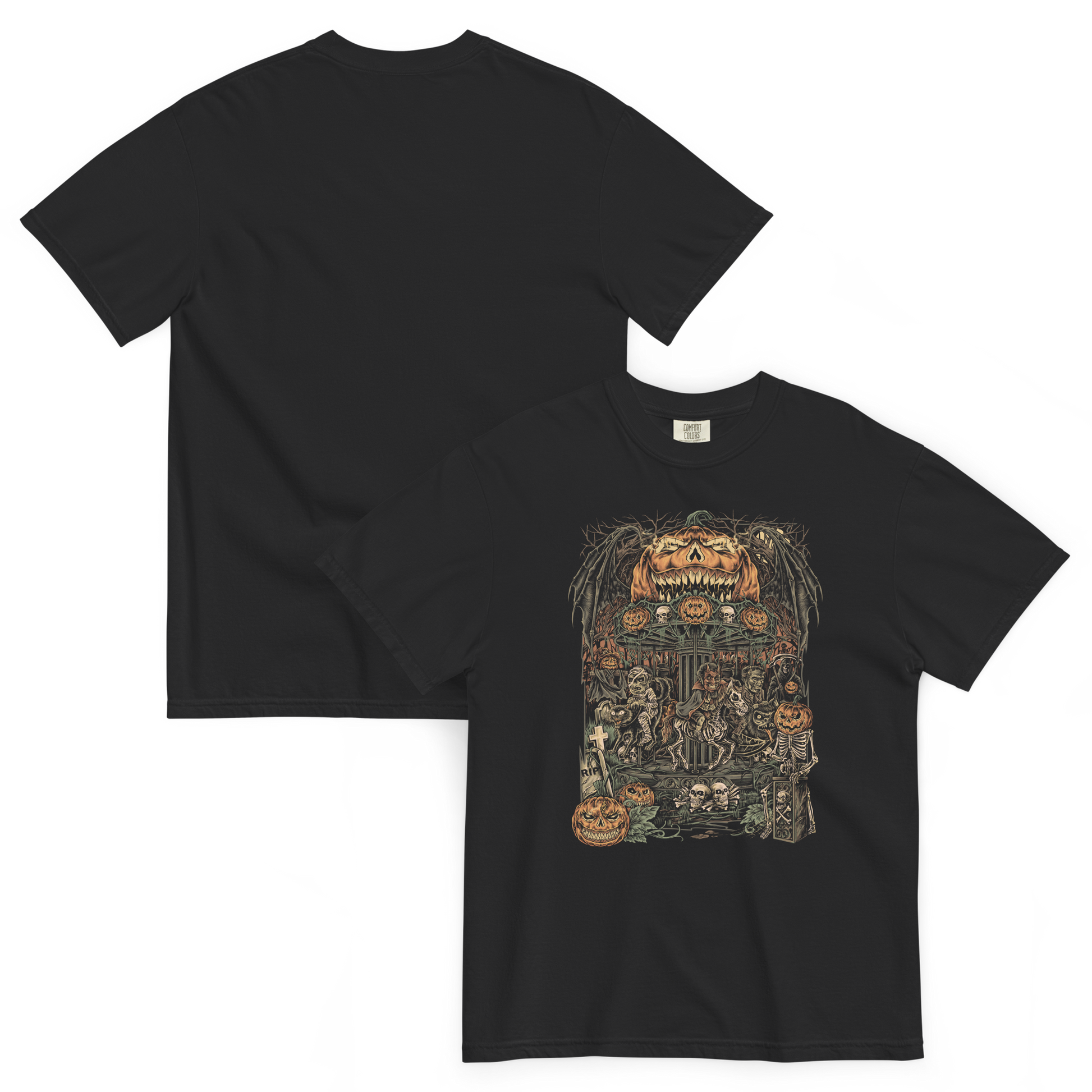 Black halloween T‑shirt featuring a haunted carnival carousel made of jack‑o’‑lanterns with skeletal horses, skulls, bats, and a gravestone under a giant grinning pumpkin head.